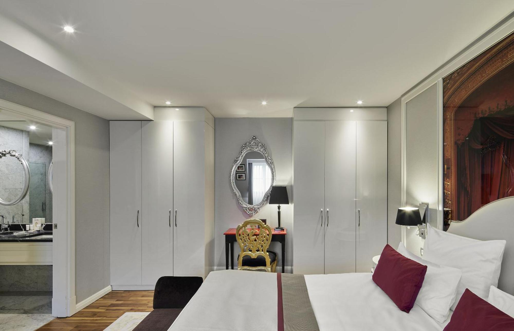 ไททานิค เกนดาร์เมนมาร์ค เบอร์ลิน โฮเทล Hotel ภายนอก รูปภาพ A bedroom at the hotel